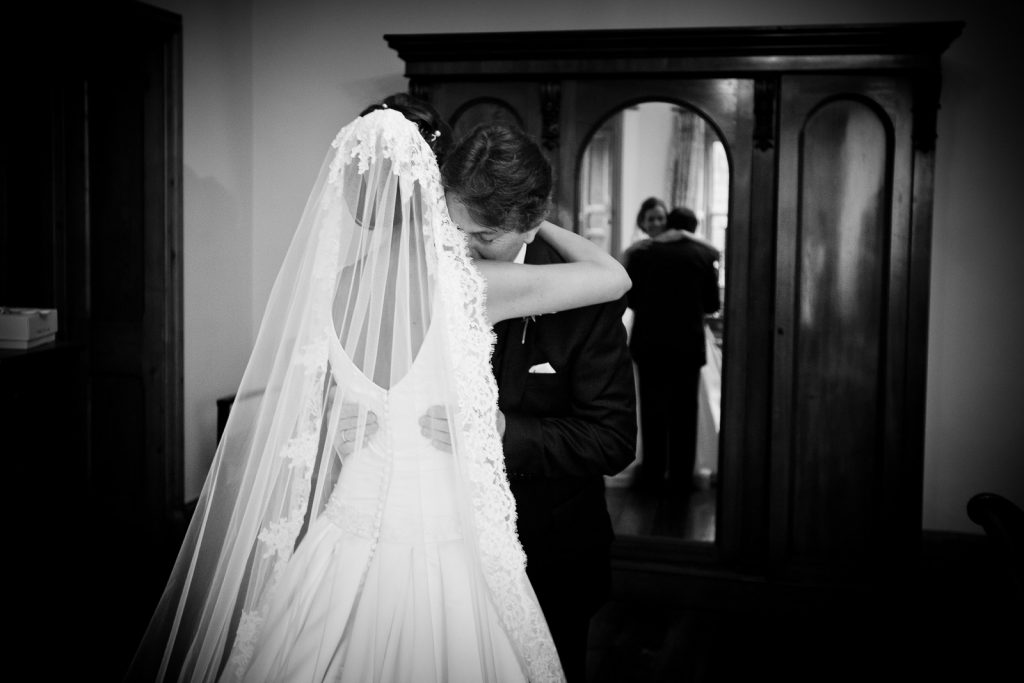Emotional Bride and Father on Wedding Day