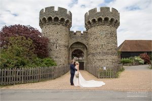 bride and groom at cooling castle barn