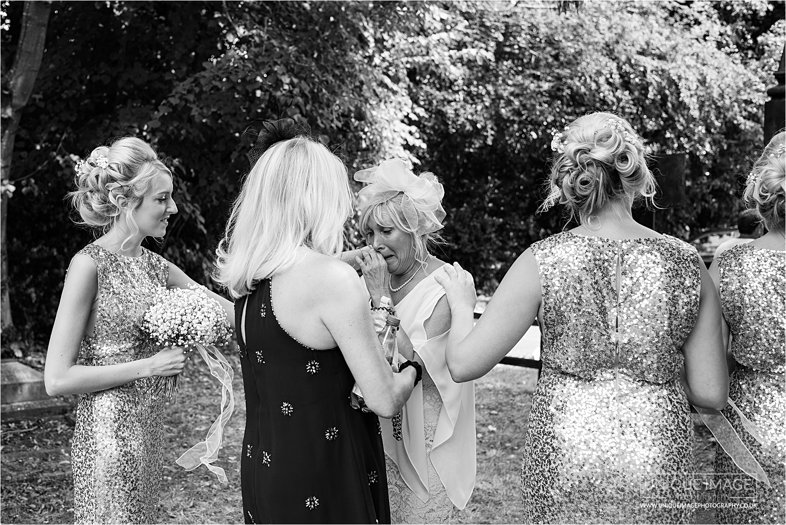 mother of the bride crying in black and white