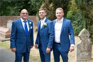 groom with his dad and brother