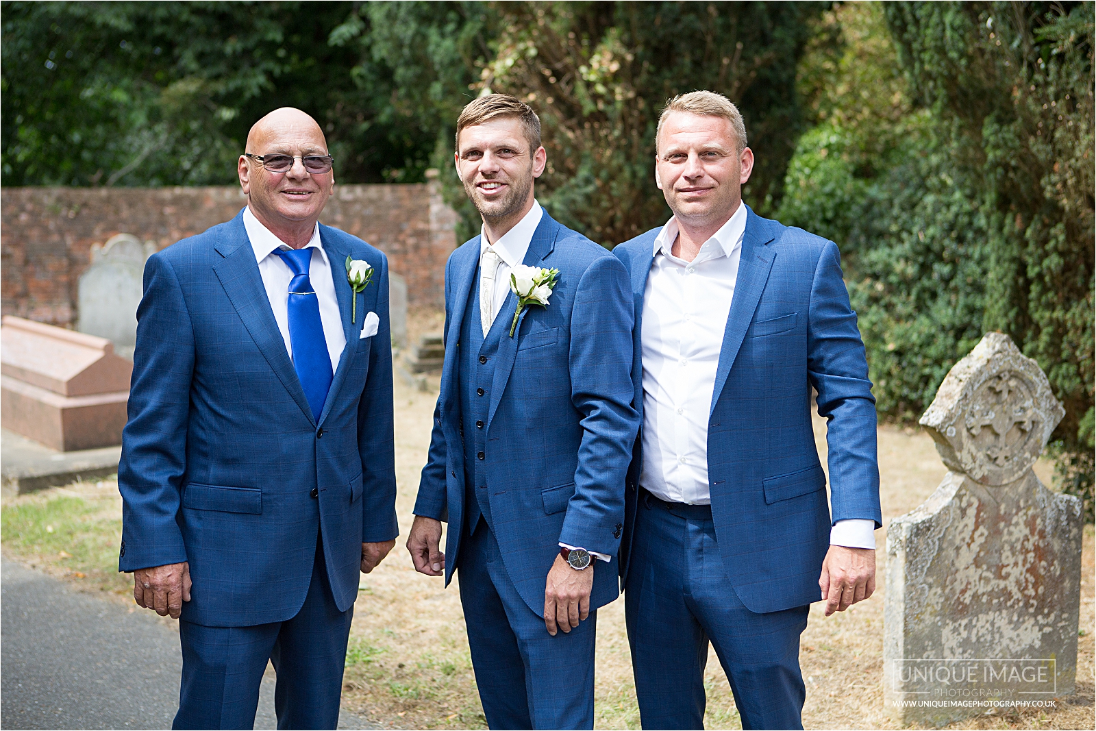 groom with his dad and brother
