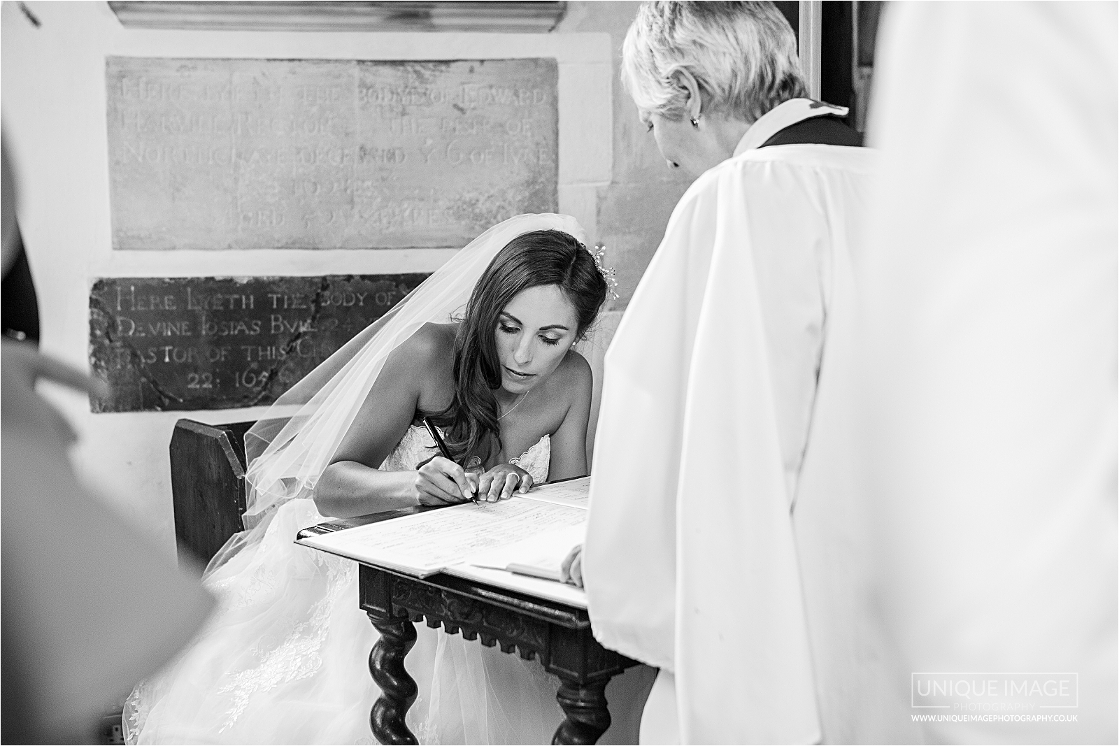 bride signing the register