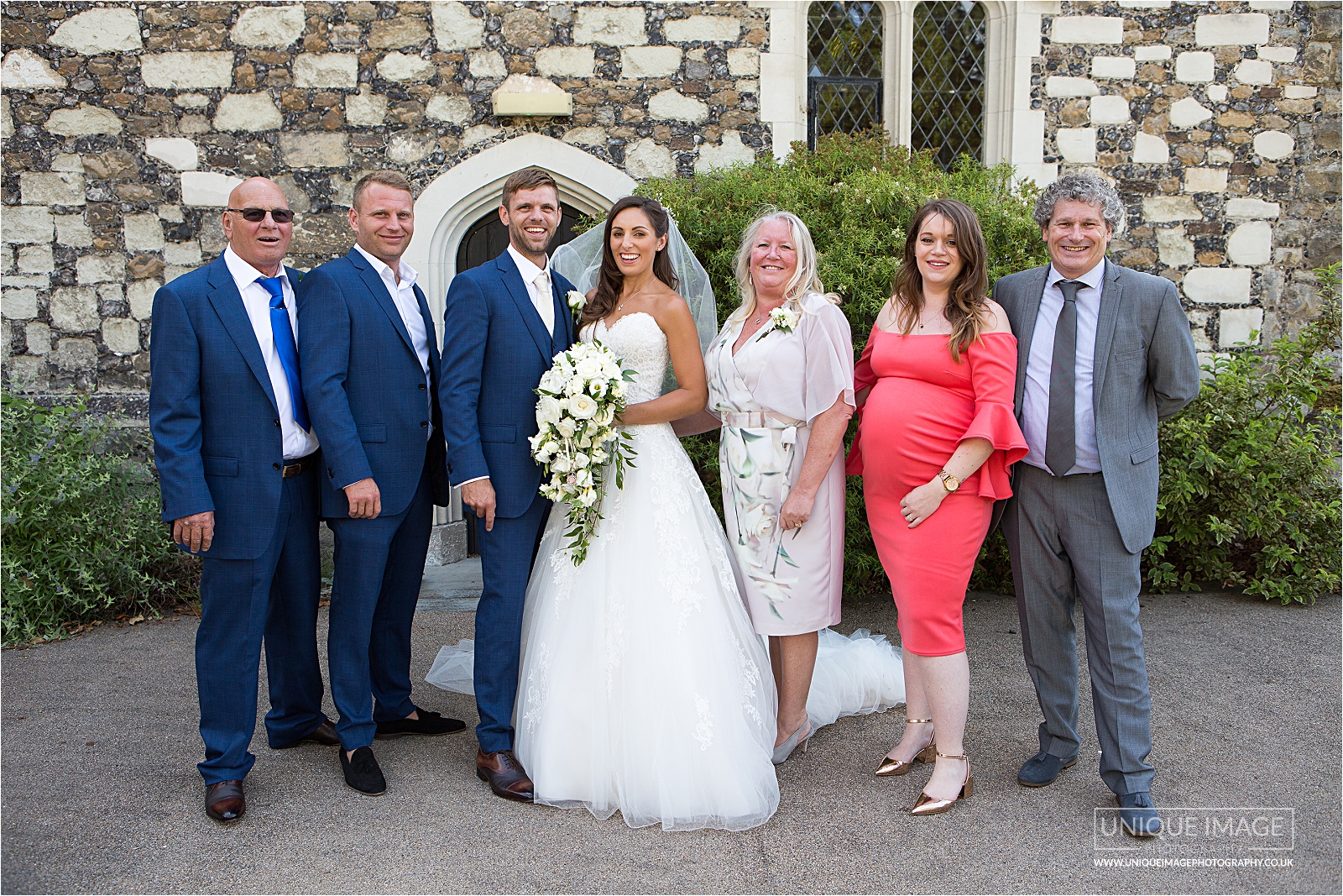 bride and groom family group