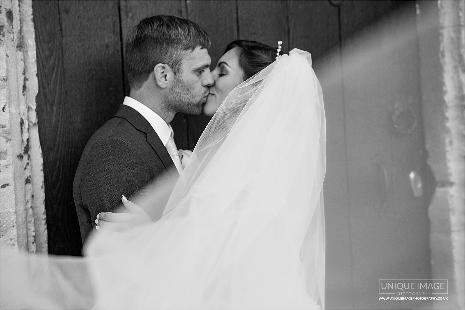 bride and groom in black and white